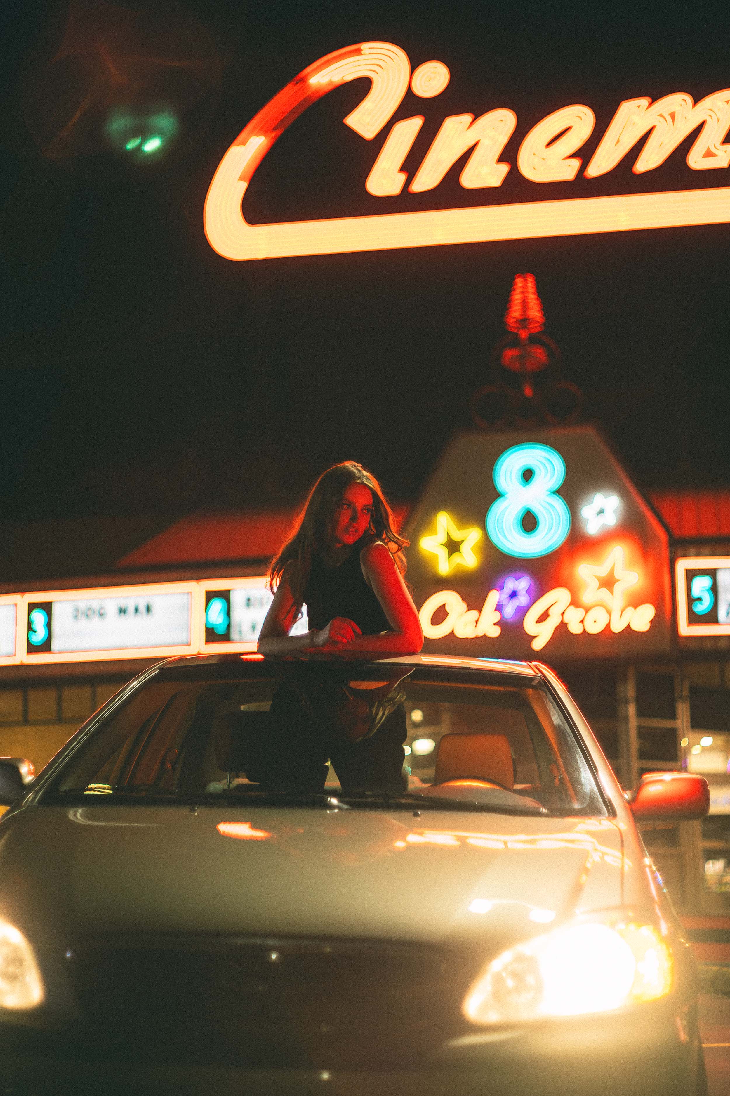Cinematic Portraits with Vintage Flair by a Movie Theater — photograph 20 of 35